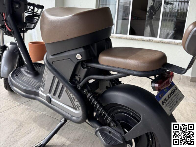 Modelo Klosh phantom 1000w, três modos de velocidade, alarme, chave e controle, freio a disco na frente. 1 ano de uso. Acompanha cadeirinha infantil.